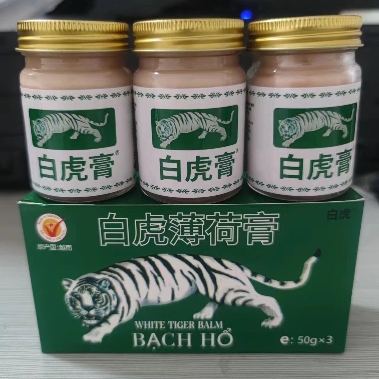 50克越南進(jìn)口白虎薄荷膏白虎膏清涼批發(fā)地?cái)倢?shí)體店涂抹膏3瓶每盒OEM代加工